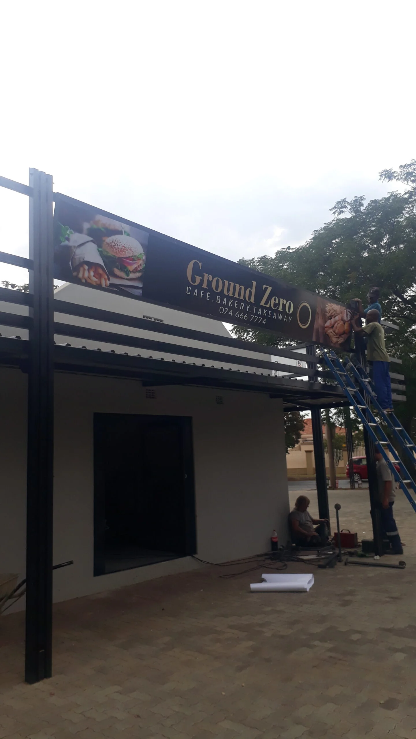 Ground Zero café billboard installation