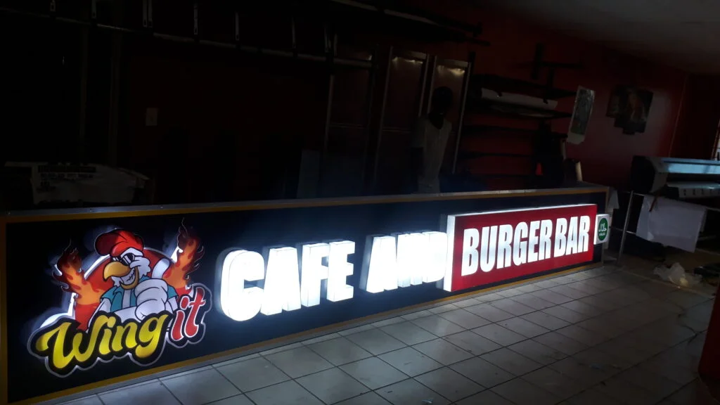 Wing It Cafe and Burger Bar illuminated sign board